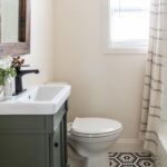 Evan Thomas Instagram - Cozy cabin vibes. #bargainblock Season 3 episode 2. Hope you liked last night’s episode! It was fun to renovate and design this house. We loved how the solution to the plumbing layout issues resulted in such a beautiful kitchen. Turning difficulties into design features is always so gratifying. Also LOVED how the butler’s pantry turned out with that vintage hutch. And that PLAID tile with those beautiful countertops 😍😍 What was your favorite part of last nights episode? Countertops: @greatlakesgm Tile: @virginiatilecompany Wallpaper: @detroitwallpaper Coffee table: @motorcitybarrels Detroit, Michigan