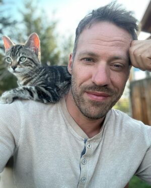 Falk Hentschel Instagram - This guy came by for a photoshoot on the ranch. I feel like he kinda mimicked my expression/vibe for each pic. He tries to hang out on my shoulder whenever i sit down anywhere. Lovely company. Minus the claws in my back as he takes his seat.😃