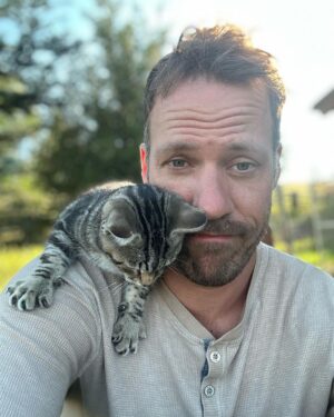Falk Hentschel Instagram - This guy came by for a photoshoot on the ranch. I feel like he kinda mimicked my expression/vibe for each pic. He tries to hang out on my shoulder whenever i sit down anywhere. Lovely company. Minus the claws in my back as he takes his seat.😃