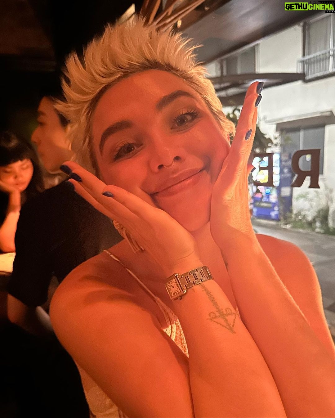 Florence Pugh Instagram - Things we learnt on our day in Tokyo.. Toby wore black jeans and regretted it. Hot. I’m finding it hard to say no to the clothes. The trees are magical and look like they can talk. It wouldn’t surprise me if you told me they can. The food is literally bursting at the seams with flavour. All I need for breakfast, lunch and dinner is dumplings. The fruit here doesn’t taste like fruit, it’s fruit squared. If I could hand deliver a single grape (oh my god the grapes here 😱) to everyone I would but I can’t and they’ll probably squish in the travel. I need another suitcase because I can’t leave things behind at the stalls. I packed wrong. High waisted jean shorts- nope. Next time= more floaty floaty things. The people here are the kindest and the purest. I want to cuddle everyone but I won’t because even though they’re kind I’m also a stranger. If there’s a gap in the buildings, you know they’ll build a cute adorable Polly pocket building that fits perfectly. I want to bathe in noodles. We cooked some hearts and some cocks and called it a night. Jet lag. Is. A. Bitch. Nothing a grape can’t fix.