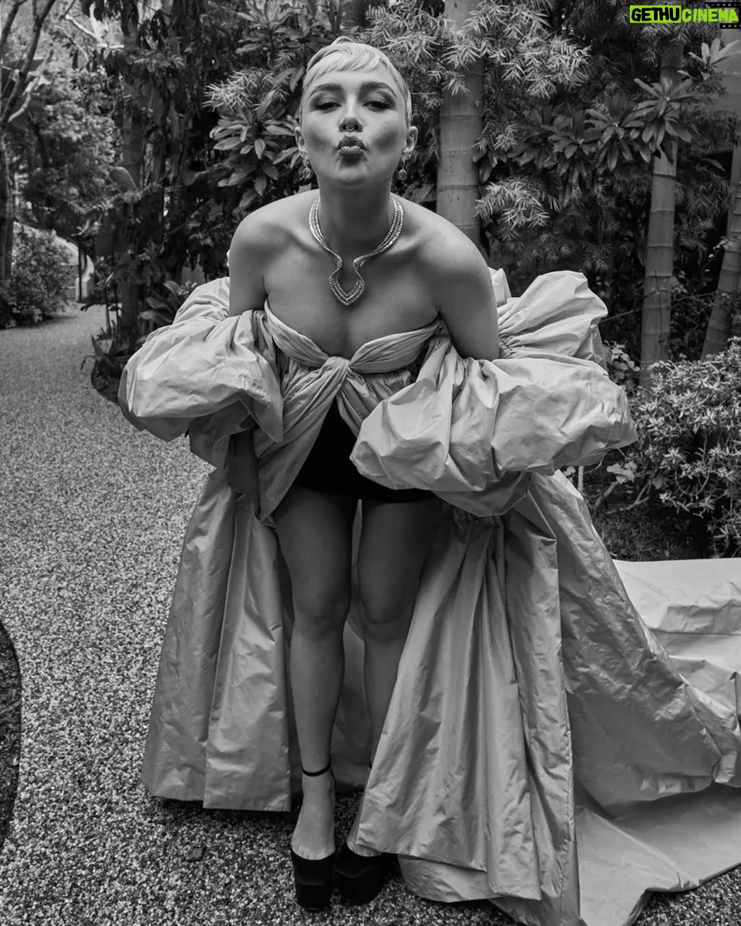 Florence Pugh Instagram - Wet stairs and @maisonvalentino gowns go perfectly.. With HUGE thanks to the talented hands that got me out the door. Another unbelievable Valentino moment, @pppiccioli and I played dress up last week in Paris and he draped this on me and safe to say we fell in love with the drama. He followed me around with his phone taking pictures of every angle. Video to come… I love the fun that explodes from his gowns, it truly is playing the best dress up my 6 year old self could possibly imagine. So happy to have these moments captured by @gregwilliamsphotography, always a pleasure prancing and blowing kisses in a garden. #maisonvalentino #oscars95