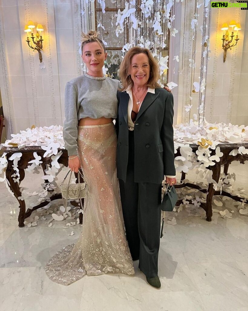 Florence Pugh Instagram - The Valentino family was full of so much love and art and passion this weekend. And ended with a big jacket potato last night. Win. And MAMA got to come!! 2nd fashion show ever and she stole the evening. Always does! Thank you to all at @maisonvalentino for inviting me, @pppiccioli I’ll never stop being amazed by your eye for shapes and colours. To another FABtastic weekend. #valentino #BlackTie #mumlooksreallycute First two slides by @sgpitalia