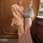 Florence Pugh Instagram - The Valentino family was full of so much love and art and passion this weekend. And ended with a big jacket potato last night. Win. And MAMA got to come!! 2nd fashion show ever and she stole the evening. Always does! Thank you to all at @maisonvalentino for inviting me, @pppiccioli I’ll never stop being amazed by your eye for shapes and colours. To another FABtastic weekend. #valentino #BlackTie #mumlooksreallycute First two slides by @sgpitalia