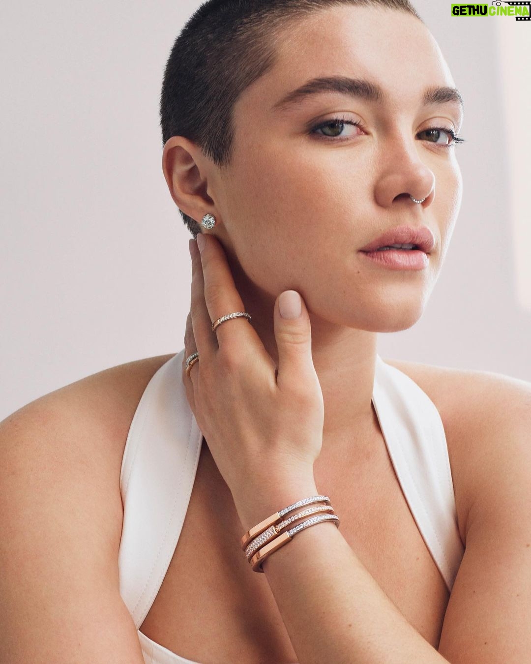 Florence Pugh Instagram - Thrilled to announce my partnership with @tiffanyandco whilst wearing the Tiffany Lock, which beautifully symbolises connection. Equally special day in shooting this campaign as I was still hiding my shaved hair at the time. Thank you for allowing me to be me, I’m very proud of what we all made that day. #TiffanyLock #TiffanyAndCo Photographer- @zoeghertner Stylist- Camilla Nickerson Hair- @peterluxhair Makeup- @babskymakeup Nails- @nailglam