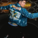 Flula Borg Instagram - can you belief it? 6 month ago was the releasing of #TheSuicideSquad! so here is some sassi fotos by @portrait_god of me röcking a absolute dope und custom #javelin supervillian jacket by @thepaintertainer!! see more of his döpeness here @jacketsbynimi !! @thesuicidesquad