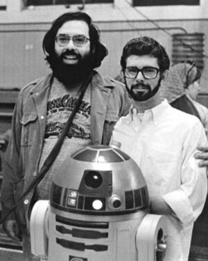 Francis Ford Coppola Instagram - I was always delighted that my friend George Lucas supposedly based the iconic character of “Han Solo” on me.
 
To George, everything in his life was sort of the inspiration for what he used. His Alaska Malamute dog INDIANA used to sit next to him in his Camaro car and was the inspiration for the "Wookie" and later for “Indiana Jones.”
 
In 1973 a young carpenter was fitting a door for American Zoetrope at Goldwyn Studios when my colleague Fred Roos asked him to help out by reading the lines written for a film called “American Graffiti.” That carpenter was Harrison Ford.