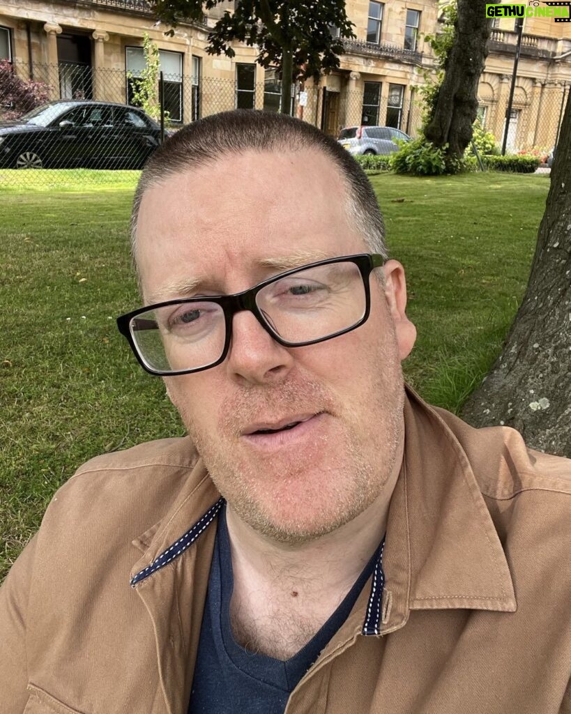 Frankie Boyle Instagram - Back from holiday and writing under a tree, as the Lord intended. That little thing on my throat turned out to be a bit of leaf, and not a Coco Pop, or whatever you were imagining