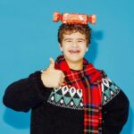 Gaten Matarazzo Instagram - I had the best time-travelling with @happysocks to capture their Holiday campaign... and guess what? I ALSO designed a gift box with 3 different sock styles in it. Wanna wear my pets on your feet this Christmas? 🐈 Well, now you know where to find it! 👉 HappySocks.com #HappySocks #HappinessEverywhere #NoTimeLikeThePresent