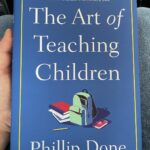 Gaten Matarazzo Instagram - You guys! I need you to do me a favor and pick up this book. Not only will teachers, new and experienced alike, enjoy this book’s love of the profession, but anybody who's ever learned in a classroom will embark on quite the nostalgia trip. And the best part? It was written by one of my own teachers! Mr. Done is genuinely one of the most influential and treasured people of my whole childhood and to see him put as much love into this book as he did his classroom completely fills my heart. #teachers #theartofteachingchildren