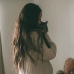 Genevieve Kang Instagram - ‘Zoey’ means life, and she enriched mine in ways I’ll be forever grateful. Zo and I met on Craigslist in 2010, it’s the only time I’ve ever online dated. we looked each other straight in the eyes and declared ourselves soulmates. Zo was my companion, a part of me. if you loved me, you had no choice but to love her too. Zo was my teacher (still is). she taught me about healthy boundaries, self-worth, and getting what you want. she taught me to never settle for anything less than what I deserve. she taught me to not take things so personally. she taught me that love isn’t to grasp or control, but rather to let go. she taught me to slow down. Zo was the kind of cat that made people who disliked cats, love cats. Zo may have left us earth side but her cheeky spirit remains with me — right now, she’s def laughing. with so much change happening in my life recently, it feels both heartbreaking and purposeful that Zo wasn’t meant to come along for this ride. but rather, her exit was meant to usher me into the next chapter. she’s witchy like that. thank you to everyone who has reached out with support. rest assured, the immense strength, love, and the endless lessons this incredible girl brought to me far outweigh the inevitable pain of loss. death and letting go are a part of life, and I’m so incredibly lucky Zoey chose me for it all. photo taken earlier this year by my dear friend @cristinagareau
