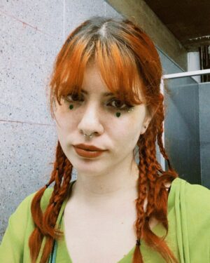 Ginebra Vega Instagram - es que me gustó el outfit🪴
(los brillitos de la cara me los pegue con ESMALTE DE UÑAS porque no tenía más pegamento de pestañas q mi profe de maquillaje no vea esto) 

pd la última foto me dio risa porque estoy tiesa pero tiesa feliz como🧍🏻‍♀️ pero 🥹