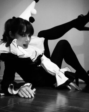 Ginger Gonzaga Instagram - Clown IRL and for Halloween. Every pic is me just trying to show that my shoes also have Pom Pom puffs on them, and my hat is still dripping Elmer’s glue. Happy Halloween!🤍🖤

Nails x @p_and_p_atl 

#happyhalloween #halloween #clown #perriotclown #leclown #tights #crafts #blackandwhite