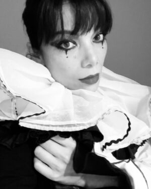 Ginger Gonzaga Instagram - Clown IRL and for Halloween. Every pic is me just trying to show that my shoes also have Pom Pom puffs on them, and my hat is still dripping Elmer’s glue. Happy Halloween!🤍🖤

Nails x @p_and_p_atl 

#happyhalloween #halloween #clown #perriotclown #leclown #tights #crafts #blackandwhite