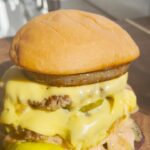 Gordon Ramsay Instagram - A Flying Dutchman recipe for the weekend but with two slices of bread !!! . Grilled Onions 🧅 Yellow onion Salt Black pepper Worcestershire Burger 🍔 80/20 ground beef Salt Mustard Butter American cheese Pickles Sauce Mayo Ketchup Sweet Relish White vinegar Potato Buns 🍞