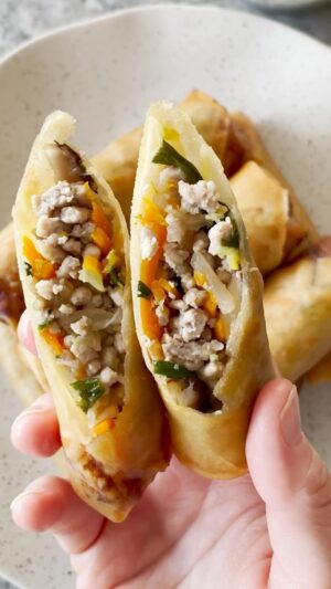 Gordon Ramsay Instagram - Celebrate Lunar New Year with these delicious Spring Rolls ! 
.
Ground pork
Shaoxing wine
Soy sauce
Oyster sauce
Sesame oil
Sugar
Salt
Shiitake mushrooms
Carrots
Cabbage
Chinese chives
Spring roll wrappers
Egg wash 
Oil, for frying