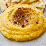 Gordon Ramsay Instagram – Autumn is in the air and this delicious squash hummus recipe is the perfect dip for the weekend or watching any sporting event ! 
.
Cinnamon
Cloves
Coriander seed
Fenugreek seed
Fennel seed
Mustard seed
Cumin seed
Butternut Squash
Garlic
Ginger
Olive oil
Tahini
Chickpeas
Lemon
Kosher salt
Pita, for serving
