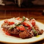 Gordon Ramsay Instagram - On our new set menu: chicken parmigiana with smoked tomato, mozzarella and fresh basil at @gordonramsaybarandgrill - try two courses for only £17 !! Gordon Ramsay Bar and Grill