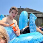 Griffin Wallace Henkel Instagram - #sibling rivalry #summer #fun #pooltime #blue #skies #texas