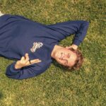 Gus De St. Jeor Instagram – not gonna lie, this grass was FREAKING itchy! Last time I do this for a merch shoot