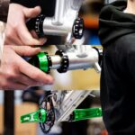 Guy Martin Instagram - How Trick is this! Guy has been riding @orangebikes for as long as he can remember, when we nudged him for an exact date we got “I've had a few hot dinners since then”. He put in a call to Orange a few weeks back as he wanted to buy a new frame, his old bike was knackered and after 35,000 miles in 7 years it needed retiring. His orange hasn’t been on all his biking adventures but it is the bike that he rides the most on his daily commute to work. The lads and lassies at Orange Bikes and @hopetech built him this trick aluminium brushed frame with Hope accessories. They arrived to his work last week and he was proper blown away by the bike as you can see in the video. Massive thanks to everyone at Orange Bikes and Hope Technology Ltd for their continued support of Guys biking. #orangebikes #hopetech #guymartin
