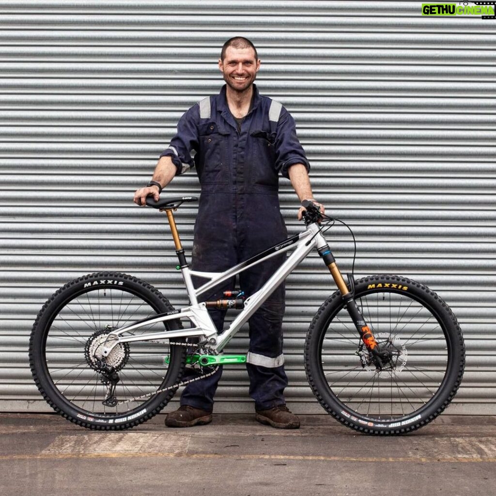Guy Martin Instagram - How Trick is this! Guy has been riding @orangebikes for as long as he can remember, when we nudged him for an exact date we got “I've had a few hot dinners since then”. He put in a call to Orange a few weeks back as he wanted to buy a new frame, his old bike was knackered and after 35,000 miles in 7 years it needed retiring. His orange hasn’t been on all his biking adventures but it is the bike that he rides the most on his daily commute to work. The lads and lassies at Orange Bikes and @hopetech built him this trick aluminium brushed frame with Hope accessories. They arrived to his work last week and he was proper blown away by the bike as you can see in the video. Massive thanks to everyone at Orange Bikes and Hope Technology Ltd for their continued support of Guys biking. #orangebikes #hopetech #guymartin