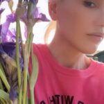Gwen Stefani Instagram - put me in a vase but u can’t stop time 🪻:) gx