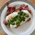 Gwyneth Paltrow Instagram – Todays #boyfriend breakfast a take on green eggs and ham by @dianemorrisey (Diane i love you, you are the best) and made it #paleo of course. 
Pesto:
2 cups tightly packed basil
3 garlic cloves
1/2 cup pine nuts&walnuts
Big squeeze of lemon
Salt/Pepper
Very generous 1/2 cup of olive oil
Pan fried beautiful Black Forest ham
Toasted paleo bread in pan with a little ghee
Fried eggs