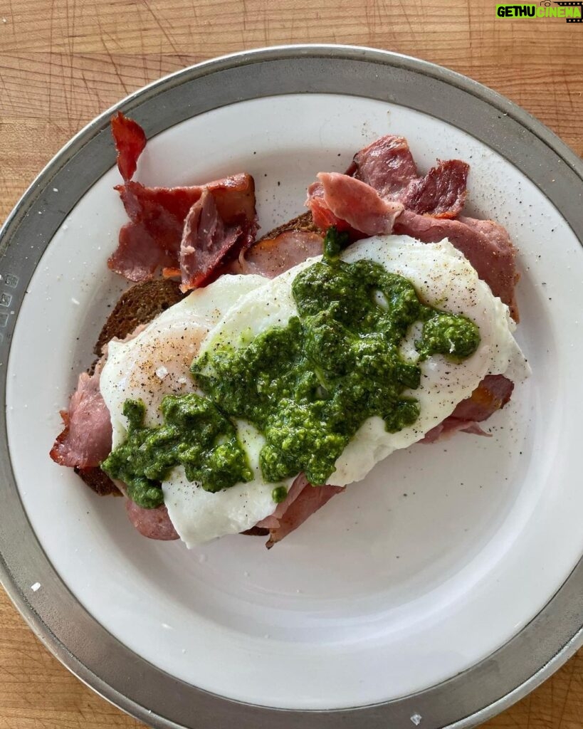 Gwyneth Paltrow Instagram - Todays #boyfriend breakfast a take on green eggs and ham by @dianemorrisey (Diane i love you, you are the best) and made it #paleo of course. Pesto: 2 cups tightly packed basil 3 garlic cloves 1/2 cup pine nuts&walnuts Big squeeze of lemon Salt/Pepper Very generous 1/2 cup of olive oil Pan fried beautiful Black Forest ham Toasted paleo bread in pan with a little ghee Fried eggs
