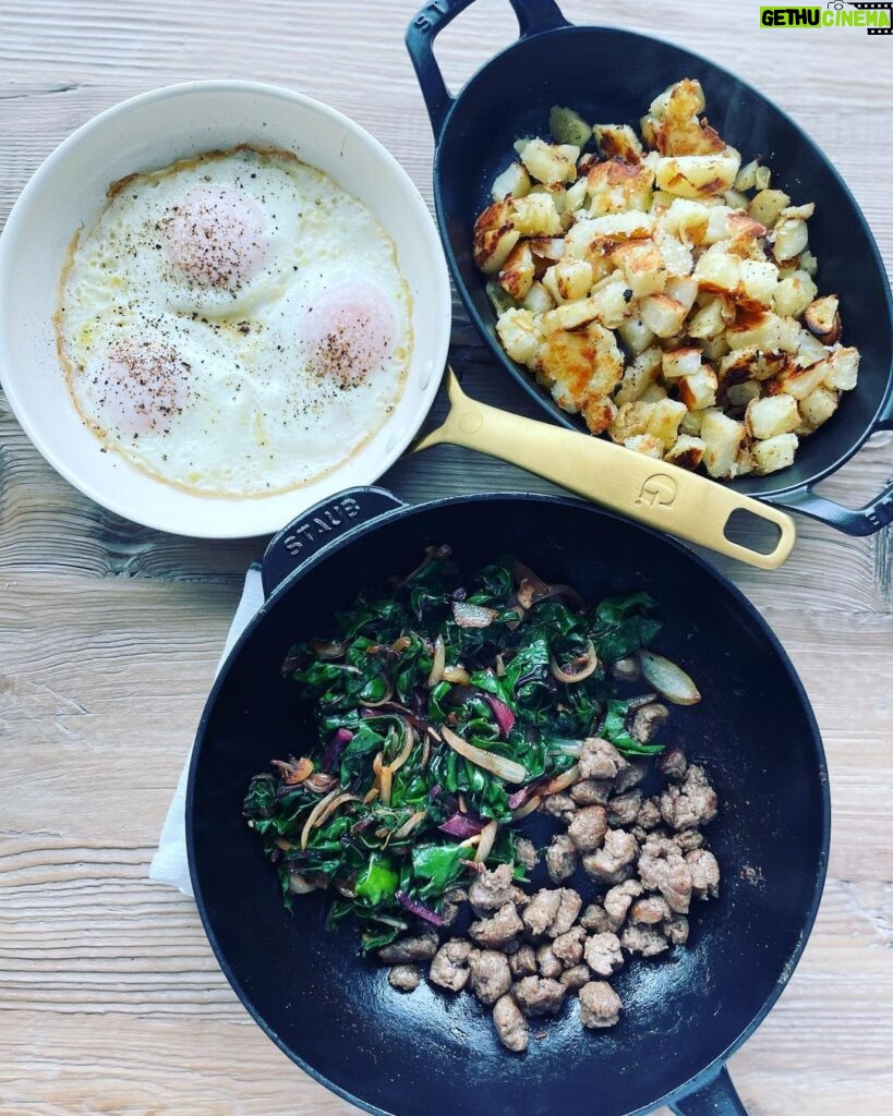 Gwyneth Paltrow Instagram - Todays #bb is skillet of lovely Swiss chard with caramelized onions and breakfast sausage, garlicky roast potatoes and some fried eggs (I learned a new technique here from one of you where you add some water to the pan while frying- revelation).