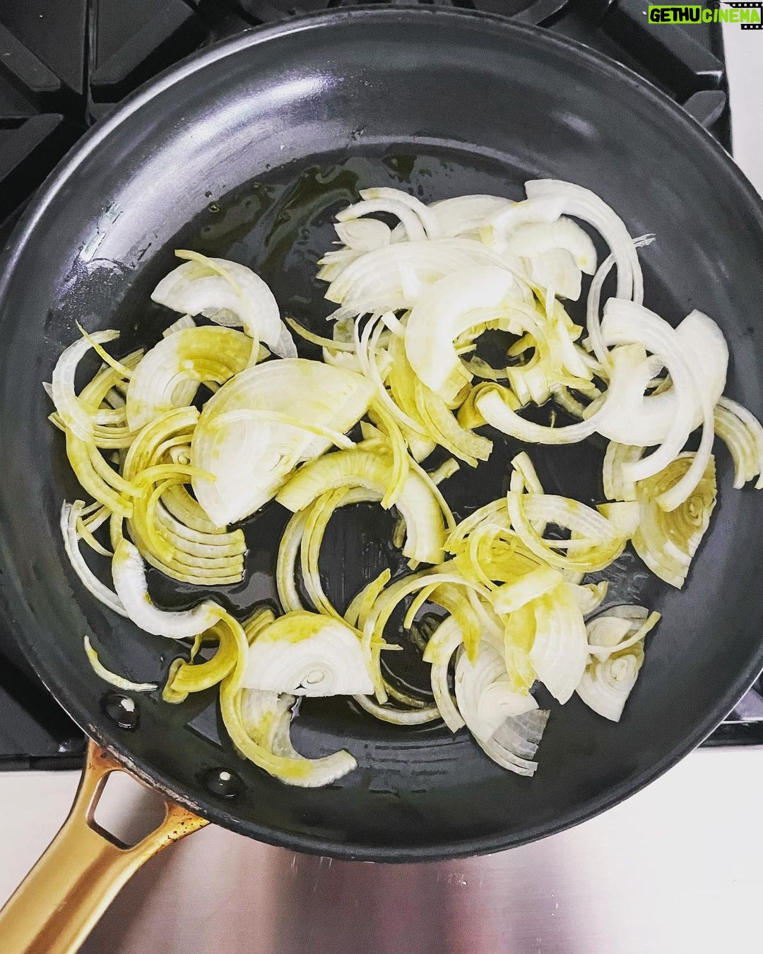 Gwyneth Paltrow Instagram - #boyfriendbreakfast today was an easy sweet potato hash. Sweat some onions Add some bell peppers and let caramalize about 10-15 mins Cube and boil sweet potatoes in salted boiling water about 10 mins and let steam and dry in the colander when ready Add garlic and cook with the peppers and onions Add sweet potatoes, some paprika and chili powder to taste Add scallions and cook for a few to let all flavors combine Fry your eggs adding water, my new favorite trick Season and add something green, I had parsley and chives so I went with that #paleo