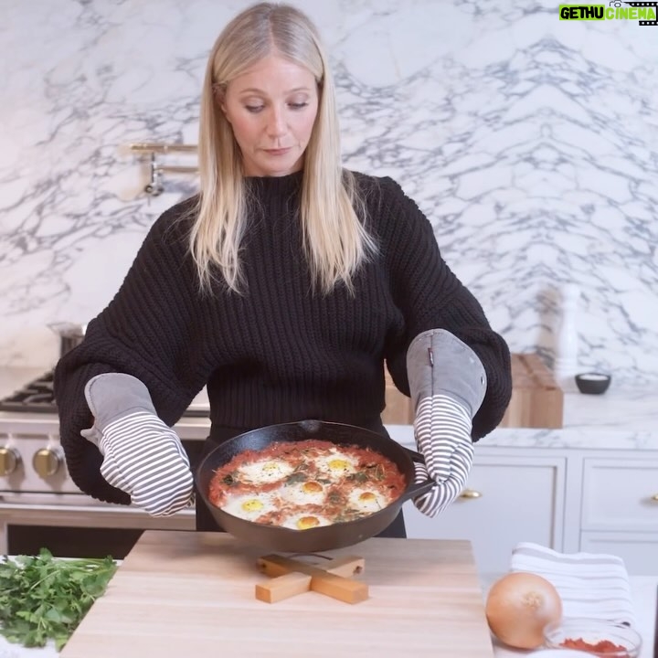Gwyneth Paltrow Instagram - This simple shakshouka is a real crowd pleaser at my house. It’s warm, comforting, and so easy to throw together. My favorite way to make it is in a cast-iron pan in my @monogramappliances hearth oven—it cooks the eggs perfectly (with crispy edges and a runny center) every time. Let me know if you try the recipe, I think you’ll love it.