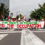 Hāwane Rios Instagram - ‘Kū Kia’i Palesetina // Solidarity March for Peace // January 28, 2024 in Honolulu, Hawai’i’ Honored to have laid down footsteps and offerings of chant and song to call for a permanent ceasefire and absolute end to the genocide of Palestine, Congo, Sudan, West Papua and all places and people suffering the devastation and soul shattering anguish of the evil powers that be. I have marched adorned in my regalia, in my sacred ‘a‘ahu since the first march we were asked to offer protocol for in 2012 for the ‘A‘ole GMO Movement in Hilo Hanakahi. It was so powerful to ‘a‘ahu in regalia alongside people that I have been in ceremony with for the past three years. We adorned in pā‘ū, kākua, lei hulu, lei momi, lei aloha from every sacred moment in prayer we have shared together in the places with stand for. When we ‘a‘ahu and when we oli, we are bringing the best of ourselves and the highest of our offerings to the place and the people we are standing up in solidarity for. I looked around and saw the words Kū Kia‘i Palesetina everywhere my eyes landed and all I could think of was how incredibly powerful it is to affirm our love for a place most of us have never been in our language and in the language of our movement for Mauna Kea which brought us into relationship on the Ala Hulu Kūpuna. So when we chant and when we include the God of the people we stand with in our prayers, it is our highest, most sacred of ceremonial expressions of devotion. I don’t just stand for Palestine. I have come to deeply love Palestine. And that is why I promise to keep speaking, keep marching, and keep posting as much as I possibly can. Because it is, to me, the correct thing to do. It is the kūpono thing to do. It is the kūpono person to be and continue to become. Aloha nā waipuna me nā ki’owai o Paleketina Mai nā kahawai a hiki loa i ka Moananuiākea E mau ke ea o ka ‘āina i ka pono I ke aloha i ka ‘oia’i’o Kū nā Kia’i Mauna a Wākea Kū nā kia’i Paleketina Inshallah Ameen From the river to the sea Palestine and Hawai’i shall be free 📸: @jenmay Puu Huluhulu
