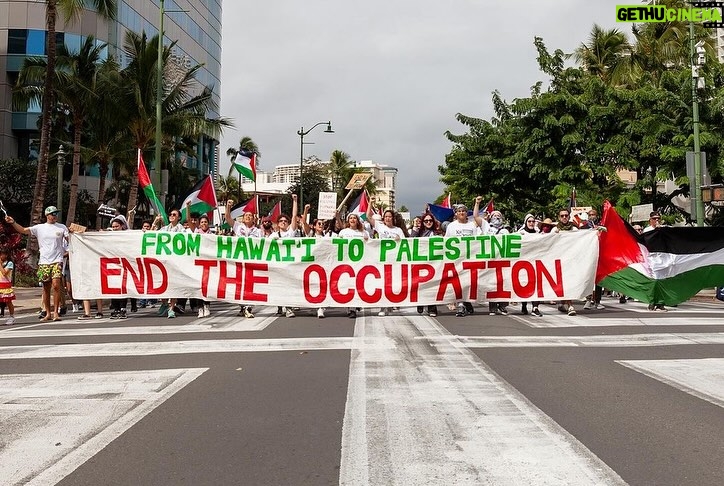 Hāwane Rios Instagram - ‘Kū Kia’i Palesetina // Solidarity March for Peace // January 28, 2024 in Honolulu, Hawai’i’ Honored to have laid down footsteps and offerings of chant and song to call for a permanent ceasefire and absolute end to the genocide of Palestine, Congo, Sudan, West Papua and all places and people suffering the devastation and soul shattering anguish of the evil powers that be. I have marched adorned in my regalia, in my sacred ‘a‘ahu since the first march we were asked to offer protocol for in 2012 for the ‘A‘ole GMO Movement in Hilo Hanakahi. It was so powerful to ‘a‘ahu in regalia alongside people that I have been in ceremony with for the past three years. We adorned in pā‘ū, kākua, lei hulu, lei momi, lei aloha from every sacred moment in prayer we have shared together in the places with stand for. When we ‘a‘ahu and when we oli, we are bringing the best of ourselves and the highest of our offerings to the place and the people we are standing up in solidarity for. I looked around and saw the words Kū Kia‘i Palesetina everywhere my eyes landed and all I could think of was how incredibly powerful it is to affirm our love for a place most of us have never been in our language and in the language of our movement for Mauna Kea which brought us into relationship on the Ala Hulu Kūpuna. So when we chant and when we include the God of the people we stand with in our prayers, it is our highest, most sacred of ceremonial expressions of devotion. I don’t just stand for Palestine. I have come to deeply love Palestine. And that is why I promise to keep speaking, keep marching, and keep posting as much as I possibly can. Because it is, to me, the correct thing to do. It is the kūpono thing to do. It is the kūpono person to be and continue to become. Aloha nā waipuna me nā ki’owai o Paleketina Mai nā kahawai a hiki loa i ka Moananuiākea E mau ke ea o ka ‘āina i ka pono I ke aloha i ka ‘oia’i’o Kū nā Kia’i Mauna a Wākea Kū nā kia’i Paleketina Inshallah Ameen From the river to the sea Palestine and Hawai’i shall be free 📸: @jenmay Puu Huluhulu
