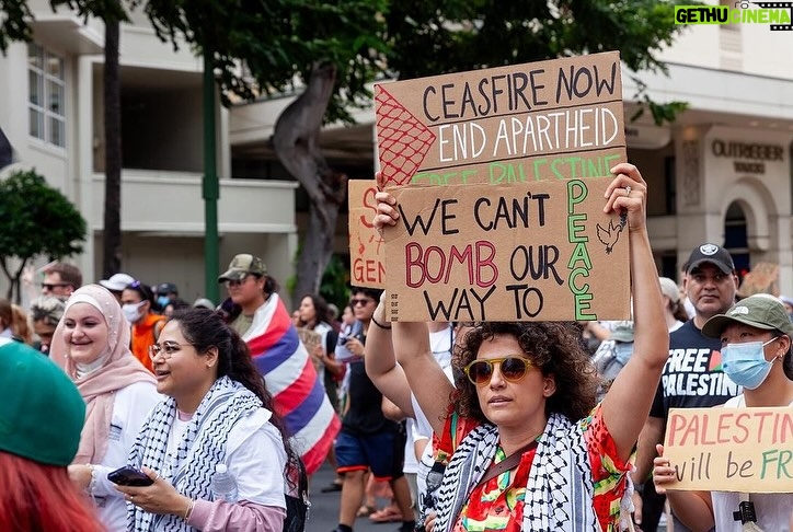 Hāwane Rios Instagram - ‘Kū Kia’i Palesetina // Solidarity March for Peace // January 28, 2024 in Honolulu, Hawai’i’ Honored to have laid down footsteps and offerings of chant and song to call for a permanent ceasefire and absolute end to the genocide of Palestine, Congo, Sudan, West Papua and all places and people suffering the devastation and soul shattering anguish of the evil powers that be. I have marched adorned in my regalia, in my sacred ‘a‘ahu since the first march we were asked to offer protocol for in 2012 for the ‘A‘ole GMO Movement in Hilo Hanakahi. It was so powerful to ‘a‘ahu in regalia alongside people that I have been in ceremony with for the past three years. We adorned in pā‘ū, kākua, lei hulu, lei momi, lei aloha from every sacred moment in prayer we have shared together in the places with stand for. When we ‘a‘ahu and when we oli, we are bringing the best of ourselves and the highest of our offerings to the place and the people we are standing up in solidarity for. I looked around and saw the words Kū Kia‘i Palesetina everywhere my eyes landed and all I could think of was how incredibly powerful it is to affirm our love for a place most of us have never been in our language and in the language of our movement for Mauna Kea which brought us into relationship on the Ala Hulu Kūpuna. So when we chant and when we include the God of the people we stand with in our prayers, it is our highest, most sacred of ceremonial expressions of devotion. I don’t just stand for Palestine. I have come to deeply love Palestine. And that is why I promise to keep speaking, keep marching, and keep posting as much as I possibly can. Because it is, to me, the correct thing to do. It is the kūpono thing to do. It is the kūpono person to be and continue to become. Aloha nā waipuna me nā ki’owai o Paleketina Mai nā kahawai a hiki loa i ka Moananuiākea E mau ke ea o ka ‘āina i ka pono I ke aloha i ka ‘oia’i’o Kū nā Kia’i Mauna a Wākea Kū nā kia’i Paleketina Inshallah Ameen From the river to the sea Palestine and Hawai’i shall be free 📸: @jenmay Puu Huluhulu