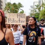 Hāwane Rios Instagram - ‘Kū Kia’i Palesetina // Solidarity March for Peace // January 28, 2024 in Honolulu, Hawai’i’ Honored to have laid down footsteps and offerings of chant and song to call for a permanent ceasefire and absolute end to the genocide of Palestine, Congo, Sudan, West Papua and all places and people suffering the devastation and soul shattering anguish of the evil powers that be. I have marched adorned in my regalia, in my sacred ‘a‘ahu since the first march we were asked to offer protocol for in 2012 for the ‘A‘ole GMO Movement in Hilo Hanakahi. It was so powerful to ‘a‘ahu in regalia alongside people that I have been in ceremony with for the past three years. We adorned in pā‘ū, kākua, lei hulu, lei momi, lei aloha from every sacred moment in prayer we have shared together in the places with stand for. When we ‘a‘ahu and when we oli, we are bringing the best of ourselves and the highest of our offerings to the place and the people we are standing up in solidarity for. I looked around and saw the words Kū Kia‘i Palesetina everywhere my eyes landed and all I could think of was how incredibly powerful it is to affirm our love for a place most of us have never been in our language and in the language of our movement for Mauna Kea which brought us into relationship on the Ala Hulu Kūpuna. So when we chant and when we include the God of the people we stand with in our prayers, it is our highest, most sacred of ceremonial expressions of devotion. I don’t just stand for Palestine. I have come to deeply love Palestine. And that is why I promise to keep speaking, keep marching, and keep posting as much as I possibly can. Because it is, to me, the correct thing to do. It is the kūpono thing to do. It is the kūpono person to be and continue to become. Aloha nā waipuna me nā ki’owai o Paleketina Mai nā kahawai a hiki loa i ka Moananuiākea E mau ke ea o ka ‘āina i ka pono I ke aloha i ka ‘oia’i’o Kū nā Kia’i Mauna a Wākea Kū nā kia’i Paleketina Inshallah Ameen From the river to the sea Palestine and Hawai’i shall be free 📸: @jenmay Puu Huluhulu