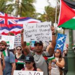 Hāwane Rios Instagram - ‘Kū Kia’i Palesetina // Solidarity March for Peace // January 28, 2024 in Honolulu, Hawai’i’ Honored to have laid down footsteps and offerings of chant and song to call for a permanent ceasefire and absolute end to the genocide of Palestine, Congo, Sudan, West Papua and all places and people suffering the devastation and soul shattering anguish of the evil powers that be. I have marched adorned in my regalia, in my sacred ‘a‘ahu since the first march we were asked to offer protocol for in 2012 for the ‘A‘ole GMO Movement in Hilo Hanakahi. It was so powerful to ‘a‘ahu in regalia alongside people that I have been in ceremony with for the past three years. We adorned in pā‘ū, kākua, lei hulu, lei momi, lei aloha from every sacred moment in prayer we have shared together in the places with stand for. When we ‘a‘ahu and when we oli, we are bringing the best of ourselves and the highest of our offerings to the place and the people we are standing up in solidarity for. I looked around and saw the words Kū Kia‘i Palesetina everywhere my eyes landed and all I could think of was how incredibly powerful it is to affirm our love for a place most of us have never been in our language and in the language of our movement for Mauna Kea which brought us into relationship on the Ala Hulu Kūpuna. So when we chant and when we include the God of the people we stand with in our prayers, it is our highest, most sacred of ceremonial expressions of devotion. I don’t just stand for Palestine. I have come to deeply love Palestine. And that is why I promise to keep speaking, keep marching, and keep posting as much as I possibly can. Because it is, to me, the correct thing to do. It is the kūpono thing to do. It is the kūpono person to be and continue to become. Aloha nā waipuna me nā ki’owai o Paleketina Mai nā kahawai a hiki loa i ka Moananuiākea E mau ke ea o ka ‘āina i ka pono I ke aloha i ka ‘oia’i’o Kū nā Kia’i Mauna a Wākea Kū nā kia’i Paleketina Inshallah Ameen From the river to the sea Palestine and Hawai’i shall be free 📸: @jenmay Puu Huluhulu