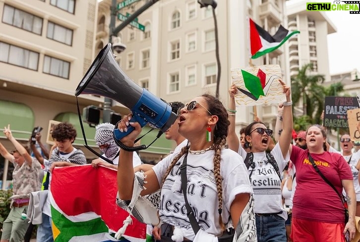 Hāwane Rios Instagram - ‘Kū Kia’i Palesetina // Solidarity March for Peace // January 28, 2024 in Honolulu, Hawai’i’ Honored to have laid down footsteps and offerings of chant and song to call for a permanent ceasefire and absolute end to the genocide of Palestine, Congo, Sudan, West Papua and all places and people suffering the devastation and soul shattering anguish of the evil powers that be. I have marched adorned in my regalia, in my sacred ‘a‘ahu since the first march we were asked to offer protocol for in 2012 for the ‘A‘ole GMO Movement in Hilo Hanakahi. It was so powerful to ‘a‘ahu in regalia alongside people that I have been in ceremony with for the past three years. We adorned in pā‘ū, kākua, lei hulu, lei momi, lei aloha from every sacred moment in prayer we have shared together in the places with stand for. When we ‘a‘ahu and when we oli, we are bringing the best of ourselves and the highest of our offerings to the place and the people we are standing up in solidarity for. I looked around and saw the words Kū Kia‘i Palesetina everywhere my eyes landed and all I could think of was how incredibly powerful it is to affirm our love for a place most of us have never been in our language and in the language of our movement for Mauna Kea which brought us into relationship on the Ala Hulu Kūpuna. So when we chant and when we include the God of the people we stand with in our prayers, it is our highest, most sacred of ceremonial expressions of devotion. I don’t just stand for Palestine. I have come to deeply love Palestine. And that is why I promise to keep speaking, keep marching, and keep posting as much as I possibly can. Because it is, to me, the correct thing to do. It is the kūpono thing to do. It is the kūpono person to be and continue to become. Aloha nā waipuna me nā ki’owai o Paleketina Mai nā kahawai a hiki loa i ka Moananuiākea E mau ke ea o ka ‘āina i ka pono I ke aloha i ka ‘oia’i’o Kū nā Kia’i Mauna a Wākea Kū nā kia’i Paleketina Inshallah Ameen From the river to the sea Palestine and Hawai’i shall be free 📸: @jenmay Puu Huluhulu