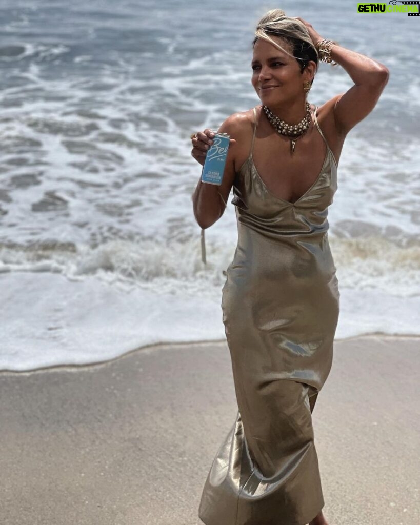 Halle Berry Instagram - Bev on the beach … but make it fashion. 😉 happy 5 years @drinkbev 🥂