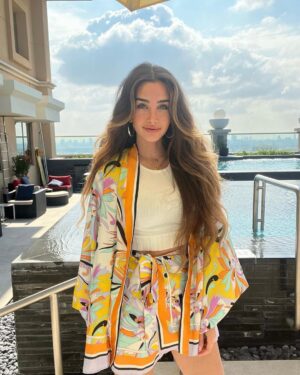 Hana Al Zahed Instagram - It’s still summer over here ☀️ 🏊‍♂️ 🧡

@travistaegypt
