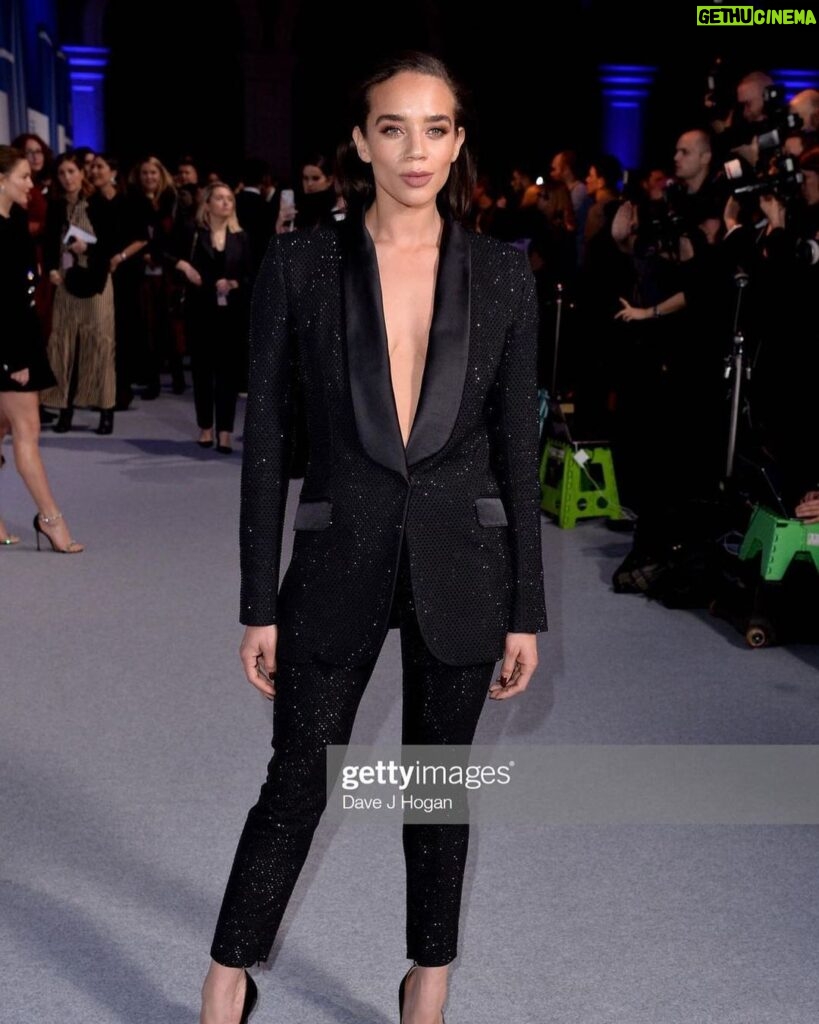 Hannah John-Kamen Instagram - Amazing time presenting at @bifa_film always a privilege to be in a room surrounded by such inspirational talent. Makeup: @ctilburymakeup Suit: @ralphandrusso Shoes: @gianvitorossi Hair: @pauledmonds217 Huge thankyou to the glam team ♥️