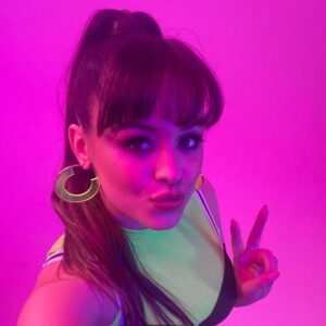 Hayley Orrantia Instagram - living for this sporty spice moment 💚