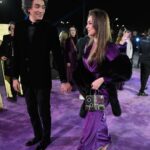 Heba Magdi Instagram - I am lucky to have you always by my side @mohamedmohsensinger From the beautiful day in Riyadh season #joyawards 💜🖤 ______________ Dress @fasateen_boutique Suit @moaaz_el_behairy MUA @hebaalshshtawi Fur @be_my_guest_shopping Jewelry @dimajewellery Bag @massrah_lets_glow