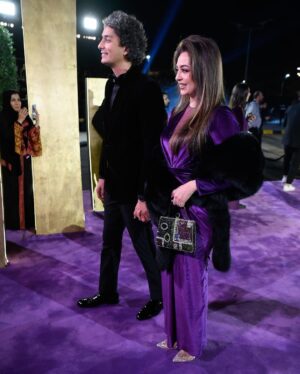 Heba Magdi Instagram - I am lucky to have you always by my side @mohamedmohsensinger 
From the beautiful day in Riyadh season #joyawards 💜🖤
______________ 
Dress @fasateen_boutique 
Suit @moaaz_el_behairy 
MUA @hebaalshshtawi 
Fur @be_my_guest_shopping 
Jewelry @dimajewellery 
Bag @massrah_lets_glow