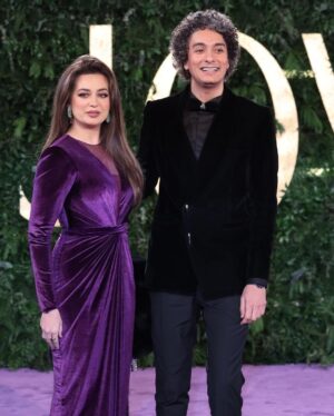 Heba Magdi Instagram - I am lucky to have you always by my side @mohamedmohsensinger 
From the beautiful day in Riyadh season #joyawards 💜🖤
______________ 
Dress @fasateen_boutique 
Suit @moaaz_el_behairy 
MUA @hebaalshshtawi 
Fur @be_my_guest_shopping 
Jewelry @dimajewellery 
Bag @massrah_lets_glow