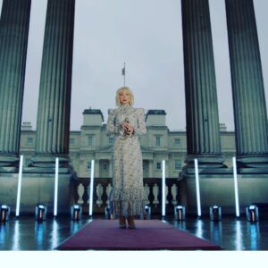 Helen George Instagram - As we celebrate the 75th Anniversary of VE Day, I managed to get out of the house and pop along to the queen’s pad. I’ve obviously mastered the talent of wearing the Union Jack on my head, but I also had the honour of singing Vera Lynn’s White Cliffs of Dover. On BBC tonight at 8pm 💙