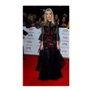 Helen George Instagram - Wonderful night at the NTAS last night, thank you @adelecany for this look I loved it 🖤 including the most amazing real jewels that I should never have been entrusted with 😬

Dress: @sophiakah 
Shoes: @dune_london 
Jewellery: @catherinebestjewellery
Hair: The amazing Bryn and George @eastonregal
Makeup: @cassiemakeup 💋