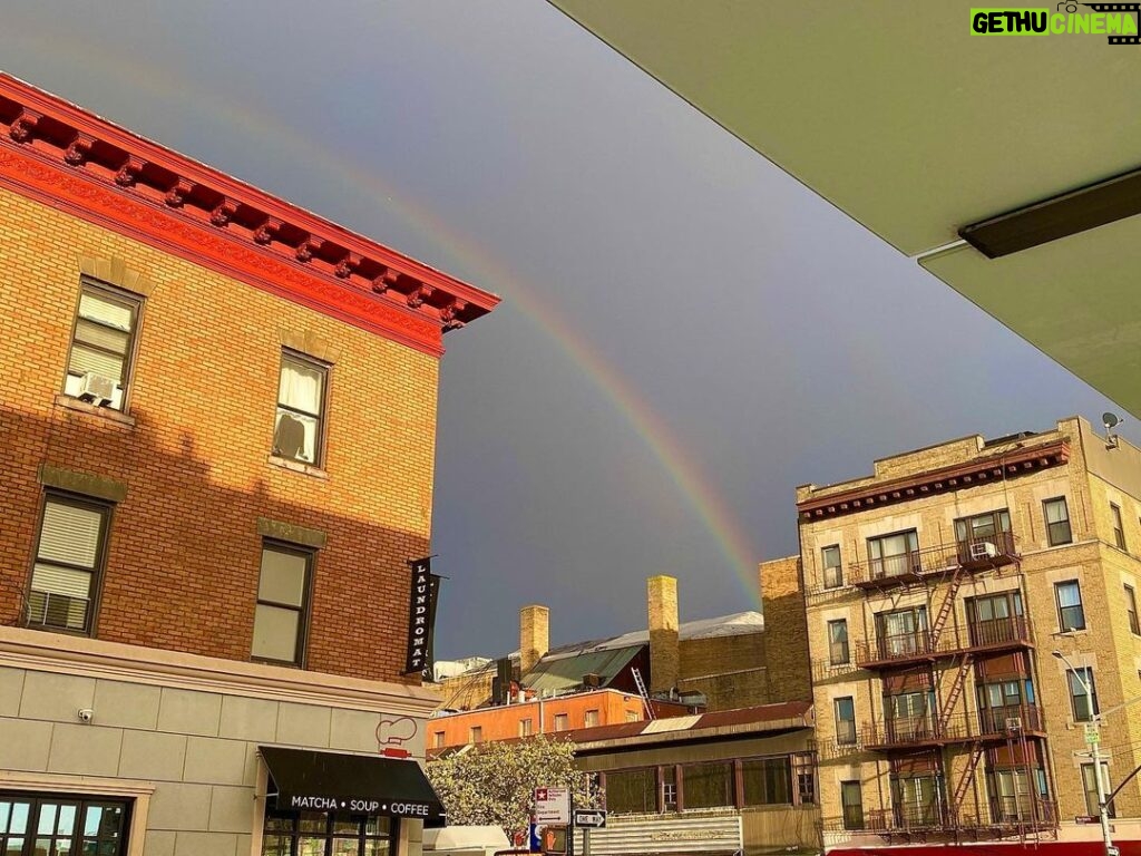 Henny Russell Instagram - Ducked under a bus stop shelter during a sudden, brief shower… and this was my reward! #rainbow #I❤NYC New York City, N.Y.