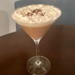 Henny Russell Instagram - Dairy-free! Espresso vodka 1:1 with Blue Diamond chocolate almond milk (sweetened), topped with Trader Joe’s coconut milk whip cream & Hu dark chocolate shavings. 🍸🤎#DELICIOUS and #Dangerous