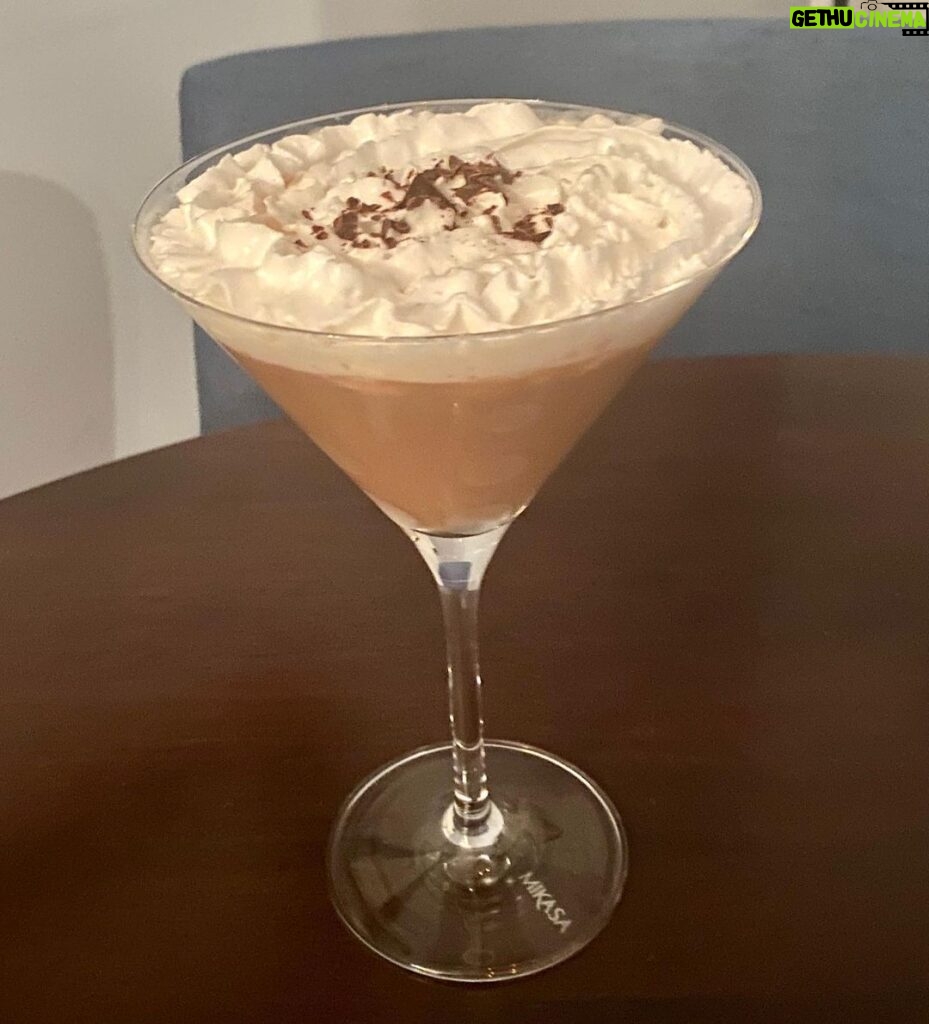 Henny Russell Instagram - Dairy-free! Espresso vodka 1:1 with Blue Diamond chocolate almond milk (sweetened), topped with Trader Joe’s coconut milk whip cream & Hu dark chocolate shavings. 🍸🤎#DELICIOUS and #Dangerous