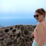 Holland Roden Instagram - Top of Sardinia ❤️ Known for their weaving in Castelsardo. Also get the fish soup but order one day in advance from #pensionepinna (also squid ink pasta!) And their house White Wine Bottle @rohamdp snapping away 📸 (and eating, snorkeling, road tripping, naturally)🌟 it’s the 1st proper vacation I have taken in NINE years 😳 I have always been thankful for the 2/3 day piggy backing I would Mickey Mouse bandage onto work trips. I am grateful to have seen the world at all. But! these few dedicated weeks I will hold dear- never a regret. Climbing into as many crevices as I can in Italy…for now